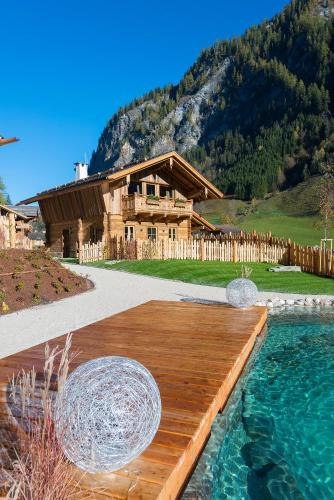 Фотография гостевого дома Chaletdorf Auszeit