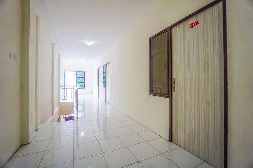 Фотография гостиницы Vaccinated Staff - OYO 1838 COZY Home