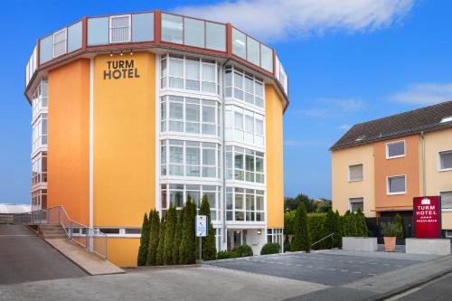 Фотография гостиницы Turmhotel Rhein-Main