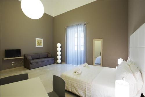 Фотография гостиницы Central Gallery Rooms- Palazzo D'Ali' Staiti XIX