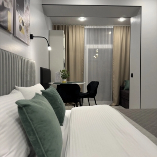 Фотография квартиры Апартаменты Пижама: "Шалфей" с кухней и стиральной машиной