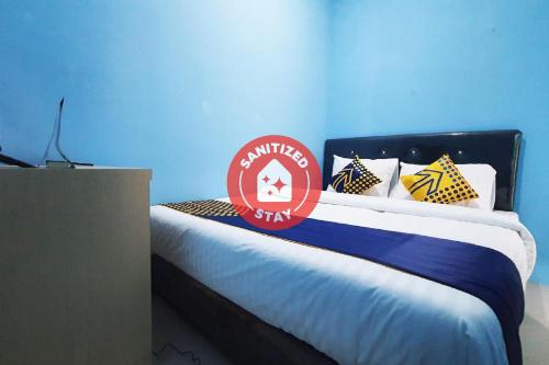 Фотографии гостиницы 
            OYO 2302 Blue House Costel Syariah