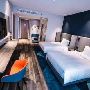 Фотографии гостиницы 
            Holiday Inn Express Ningbo Fenghua, an IHG Hotel