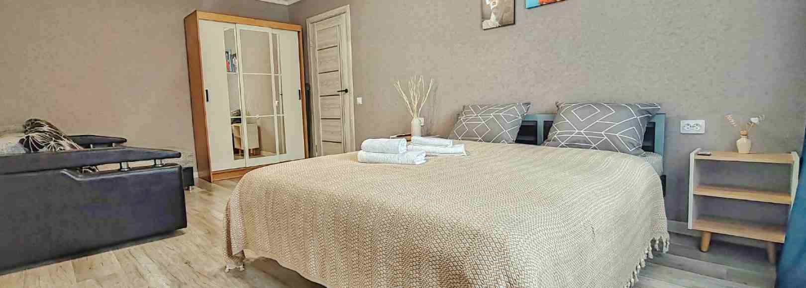 Фотография квартиры Уютно - и точка на Мира с парящей кроватью