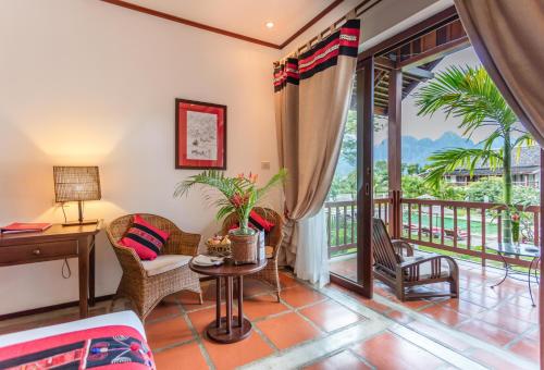 Фотография гостиницы Riverside Boutique Resort, Vang Vieng