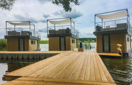 Фотография базы отдыха Pajda Mazur - Domki na wodzie, Domki i Apartamenty