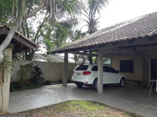 Фотография гостевого дома Linda casa c/ piscina e conforto próximo do Mar