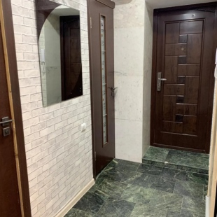 Фотография квартиры Уютные трехкомнатные апартаменты на улице Калинина