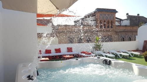 Фотография гостиницы Hotel y Apartamentos Doña Lola