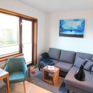 Фотография гостевого дома Kapitaenshaus-Lassen-Zimmer-Nes-Puek