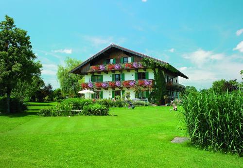 Фотография гостевого дома Gästehaus Bauer am Golfplatz