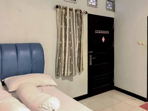 Фотография гостиницы Aimer Guest House Syariah RedPartner