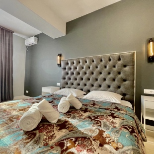 Фотография квартиры Апартаменты Центр города: уют и огни мегаполиса