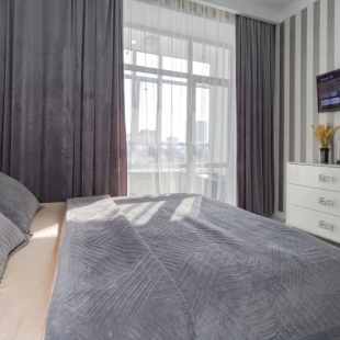 Фотография квартиры Апартаменты Cozy City Retreat near Arena & Botanical Garden