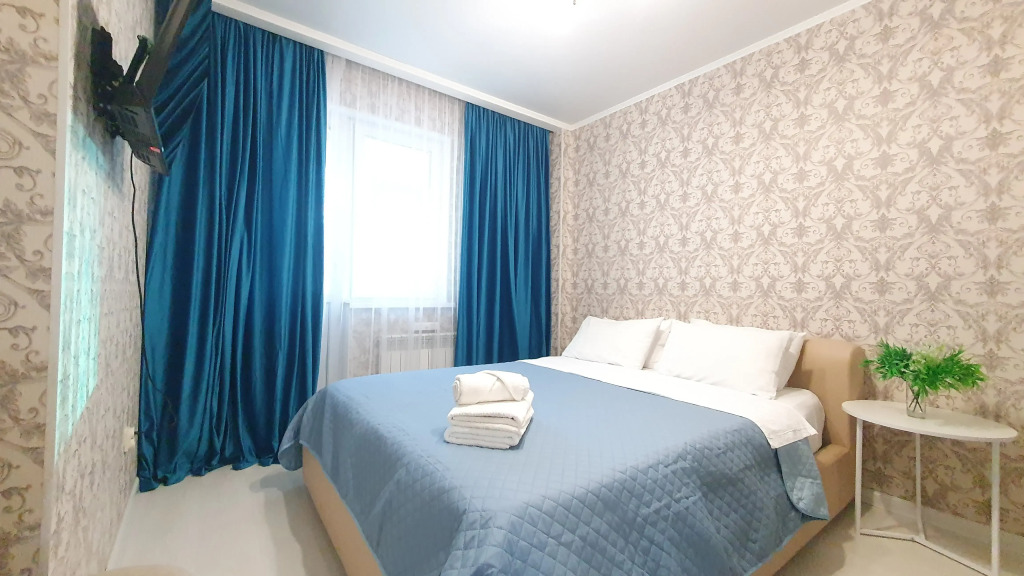 Фотография квартиры Апартаменты  с 2-мя кроватями и одноместный диван в центре Астаны