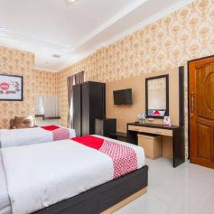Фотографии гостиницы 
            Capital O 540 Esther Hotel