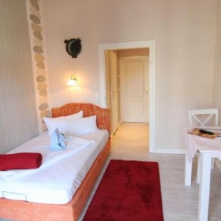 Фотография гостевого дома Kapitaenshaus-Lassen-Zimmer-Sindbad