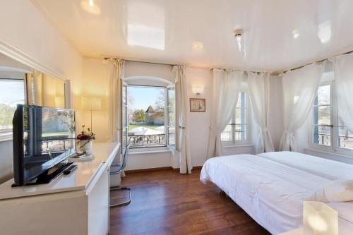 Фотография гостиницы L'Hôtel by Hostellerie du Château