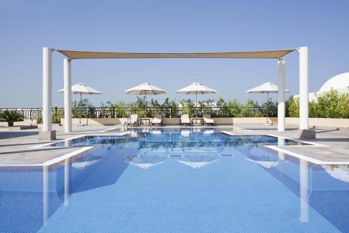 Фотография апарт отеля Mövenpick Hotel Apartments Al Mamzar Dubai