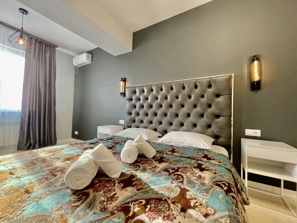 Фотография квартиры Апартаменты Центр города: уют и огни мегаполиса