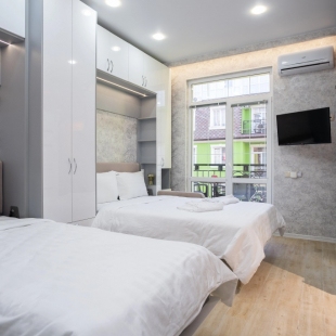 Фотография квартиры Апартаменты RED APARTMENTS Арт Лайт Сити апартамент Бенуа