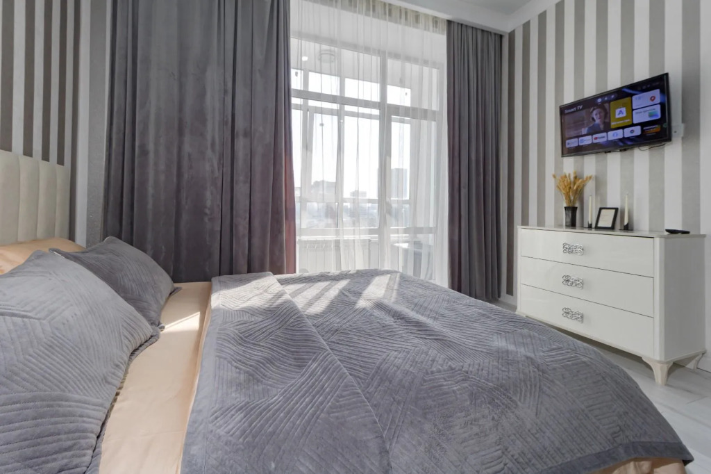 Фотография квартиры Апартаменты Cozy City Retreat near Arena & Botanical Garden