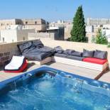 Фотография гостевого дома Sui Tetti Luxury Rooms