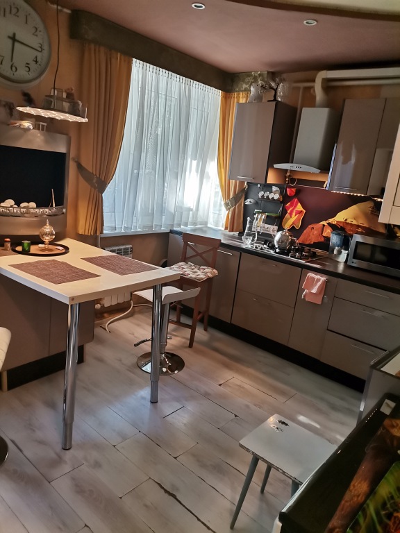 Фотография квартиры Апартаменты с камином в центре города