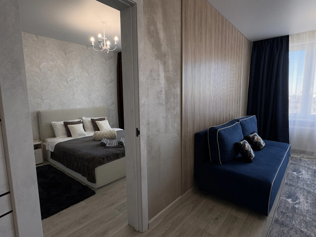 Фотография квартиры Квартира Уютная большая 1-комнатная с отдельной спальней на 21 этаже с панорамным видом на город